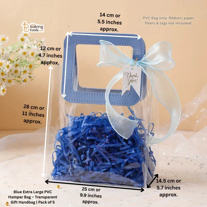 Blue extra large PVC hamper bag with transparent gift handbag, ribbon, and tag on a beige background.