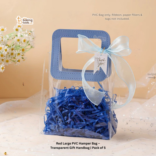 Clear gift bag with blue interior, ribbon, and tag on a beige background