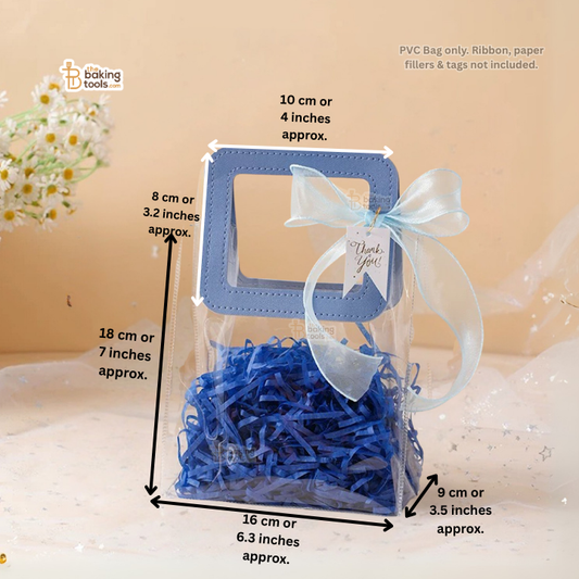 Clear plastic bag with blue shredded paper and a bow, with measurements indicated.