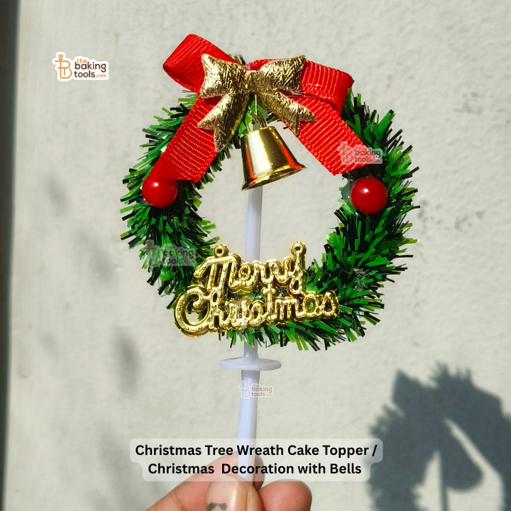 Christmas tree wreath cake topper with bells and 'Merry Christmas' text