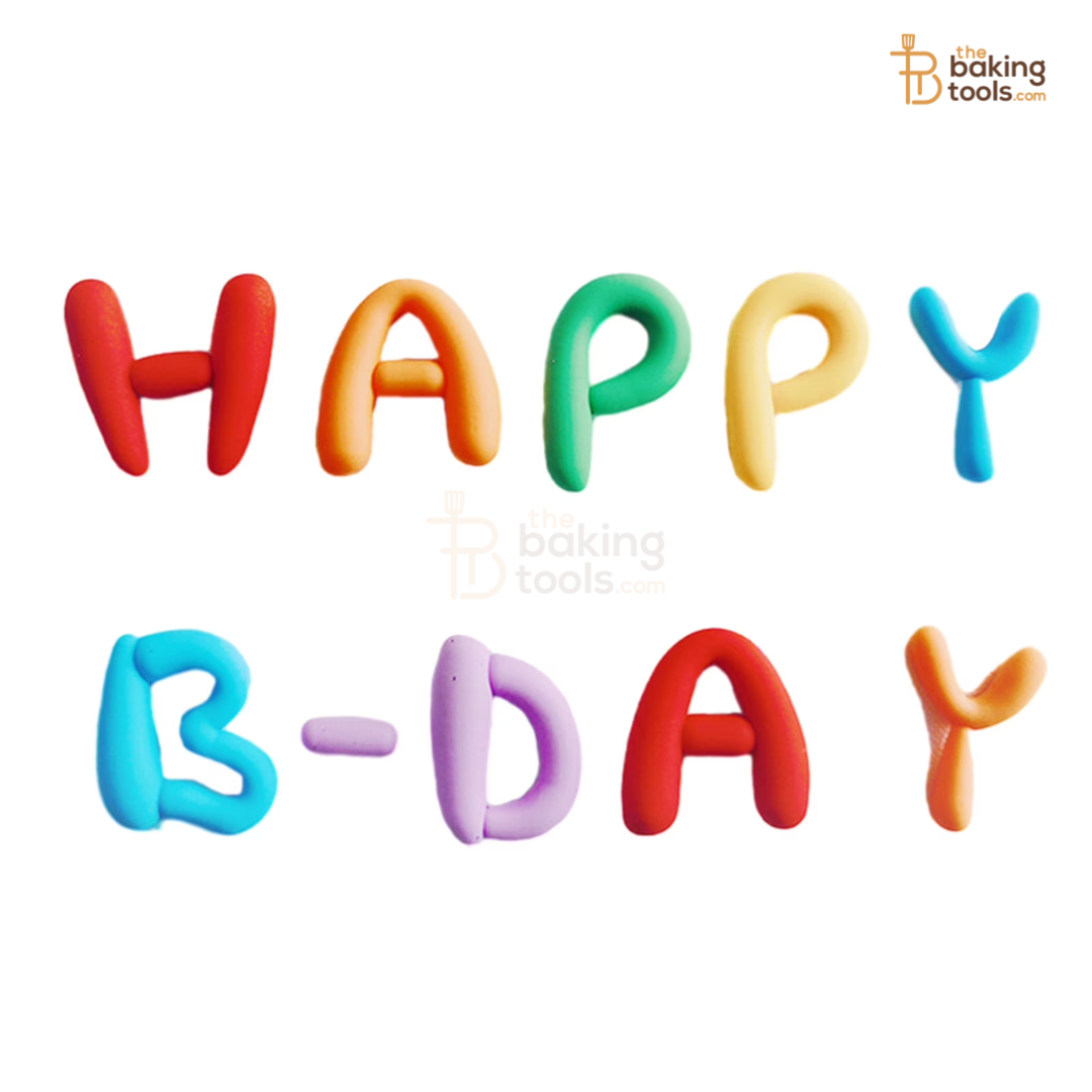 Colorful 'Happy Birthday' text made of dough-like material on a white background with 'The Baking Tools' logo.