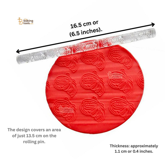 Red silicone mat with embossed designs and measurements on a white background