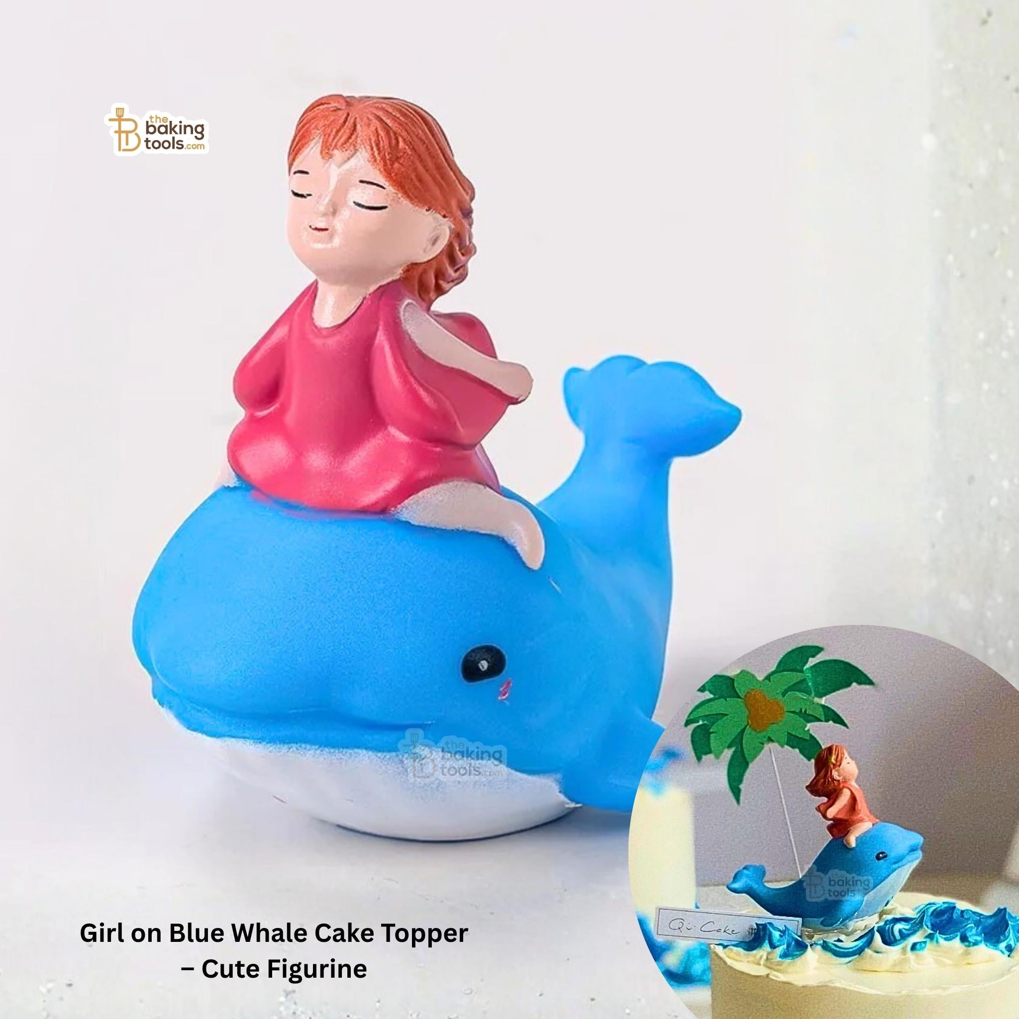 Cake topper with a girl riding a blue whale on a white background