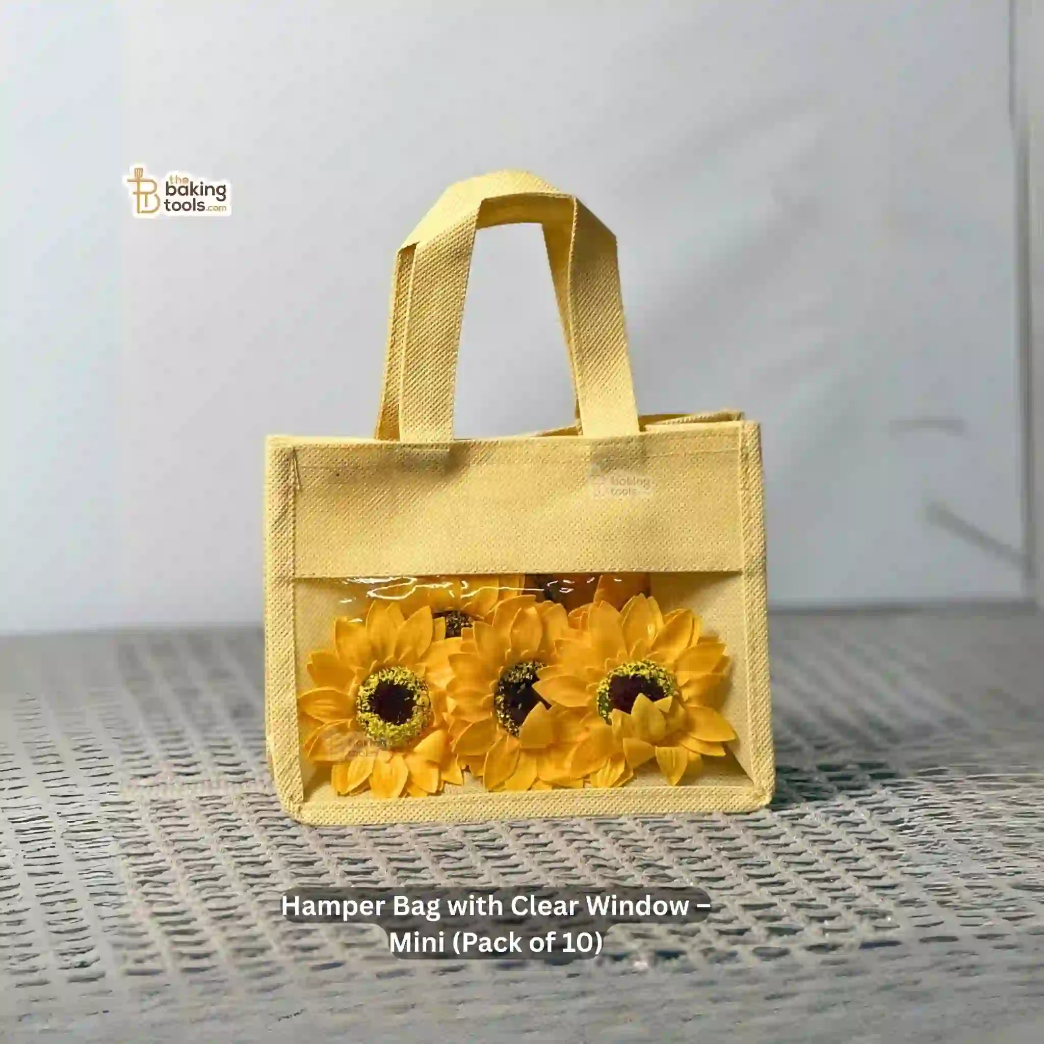 Yellow or peach hamper bag with a clear window 