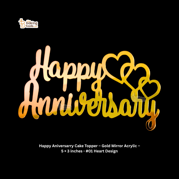 Gold mirror acrylic 'Happy Anniversary' cake topper with heart designs on a black background.