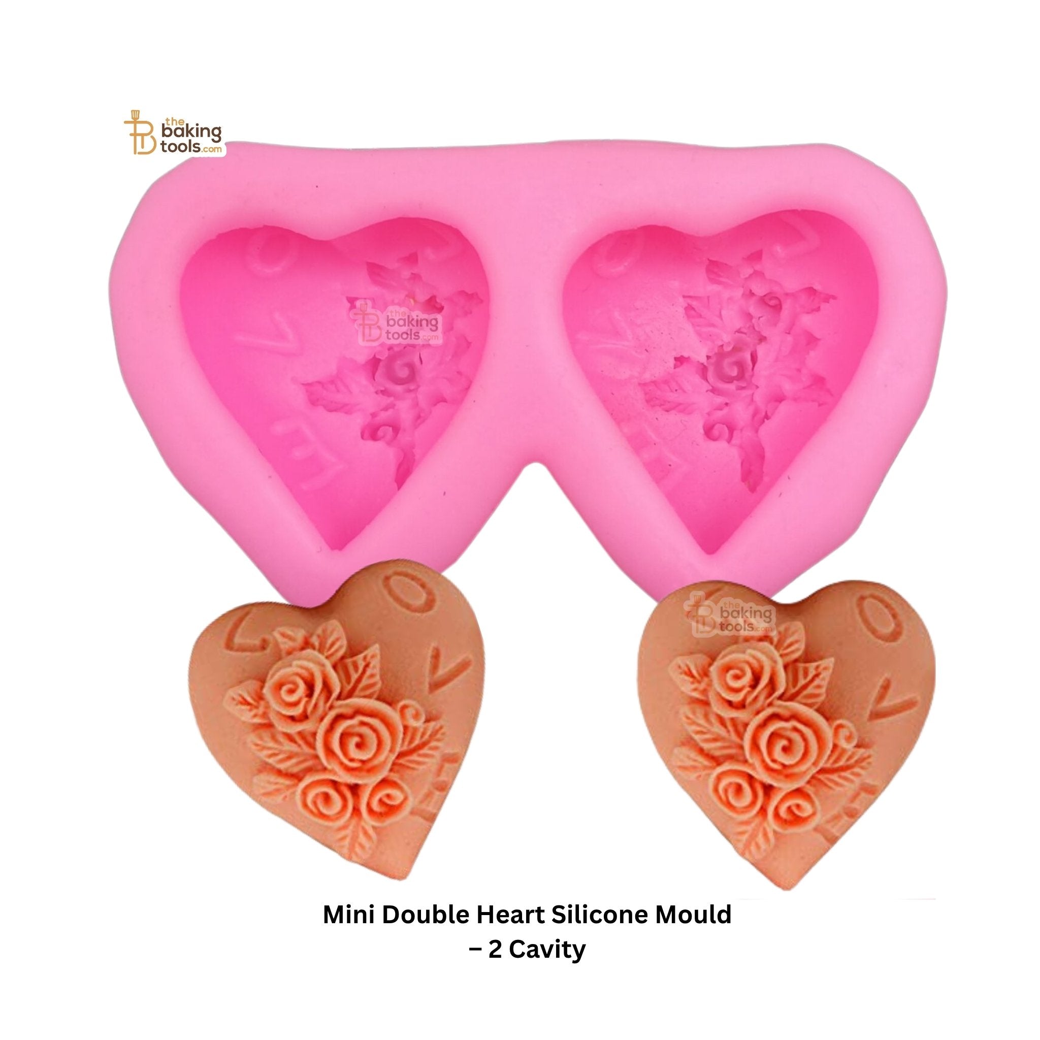 Pink double heart silicone mold with floral designs on a white background