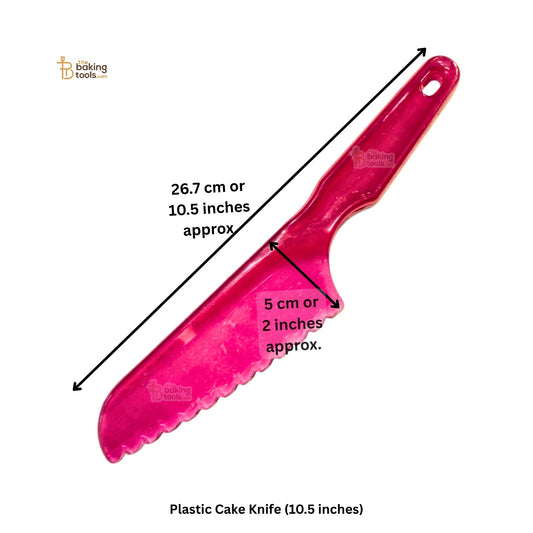 A plastic cake knife with measurements against a white background. The knife is approximately 10.5 inches long, with a blade edge of approximately 5 cm or 2 inches in width