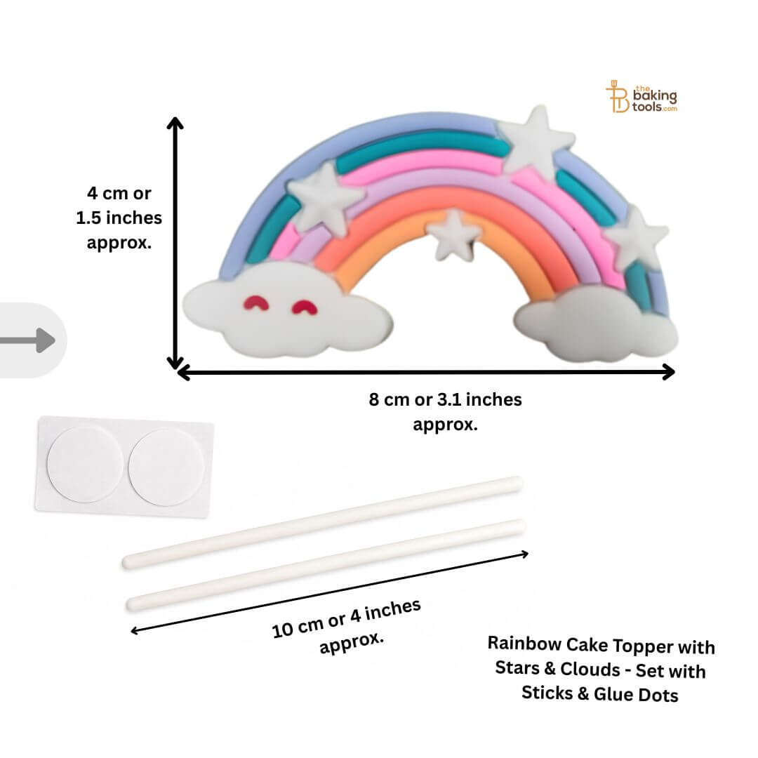 Rainbow cake topper with stars and clouds, sticks, and glue dots with measurements