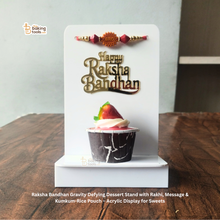 Raksha Bandhan dessert stand with a cupcake and rakhi