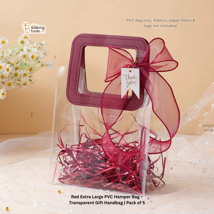 Red extra large PVC hamper bag with ribbon and tag on a beige background