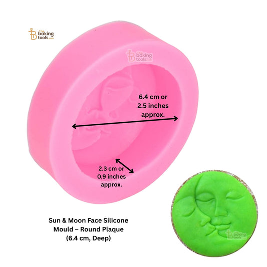 Pink sun and moon face silicone mould with measurements and a green moulded product on a white background.