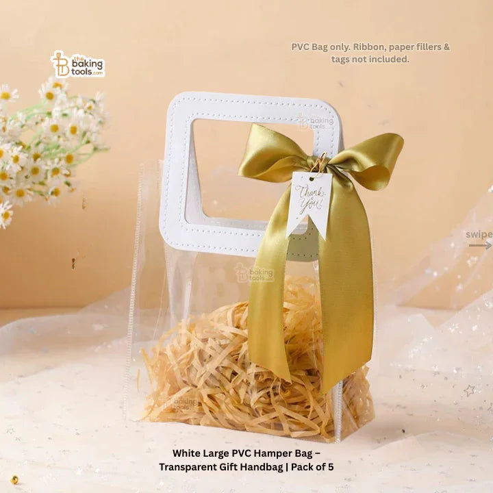 White large PVC hamper bag with a yellow ribbon and tag on a beige background