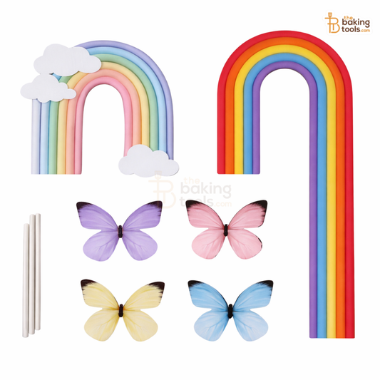 Colorful rainbow-shaped baking tools with butterflies on a white background