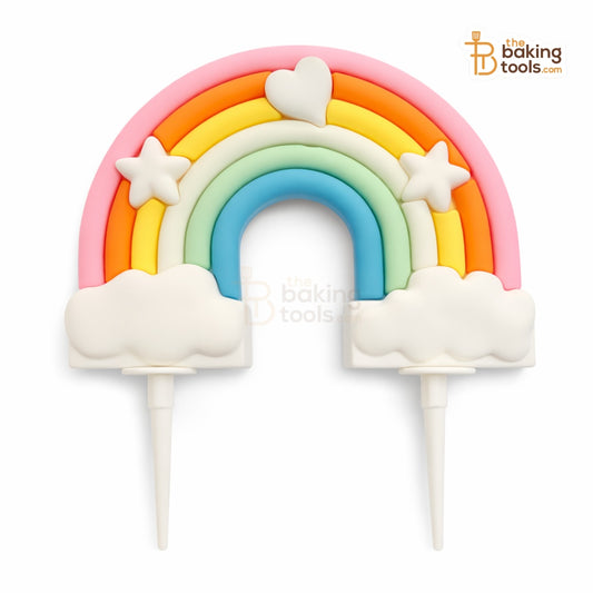Colorful rainbow cake topper with clouds on a white background, branded 'The Baking Tools'.
