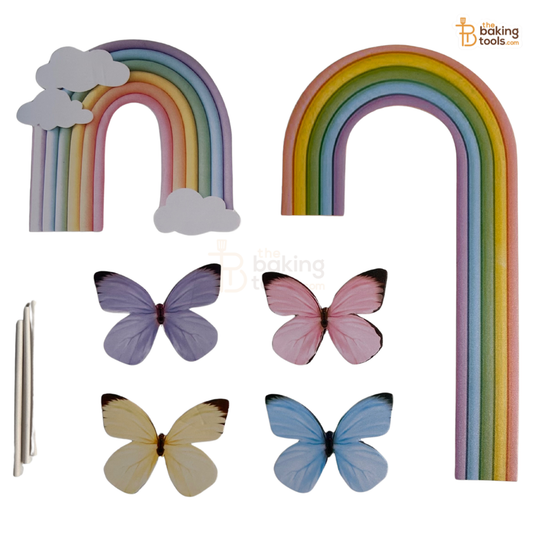 Set of rainbow-shaped baking tools with butterflies on a white background